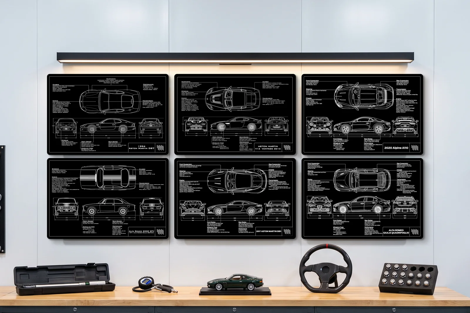 2010 Aston Martin V12 Vantage, one of six on a workshop wall