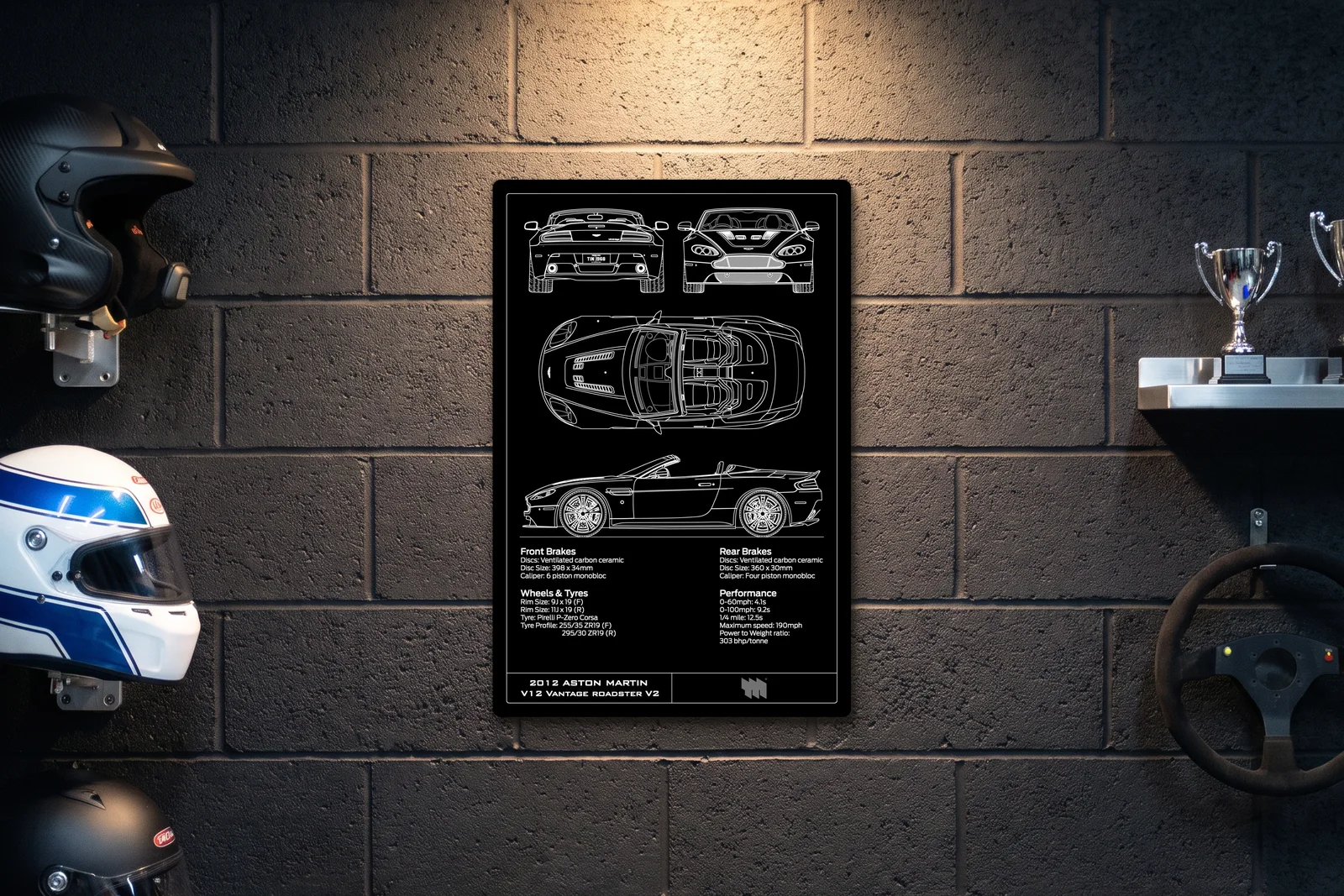 2012 Aston Martin V12 Vantage Roadster V2, on a racing wall, portrait