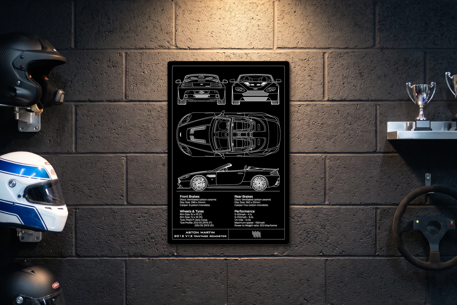 2012 Aston Martin V12 Vantage Roadster, on a racing wall, portrait