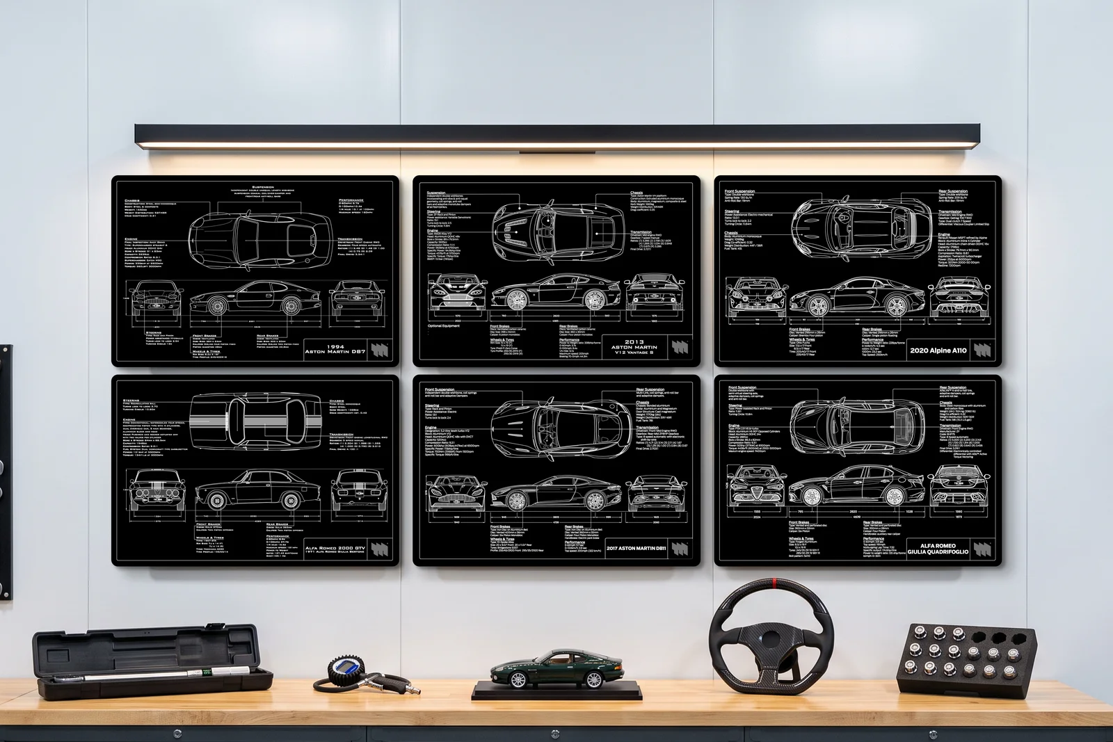 2013 Aston Martin V12 Vantage S, one of six on a workshop wall