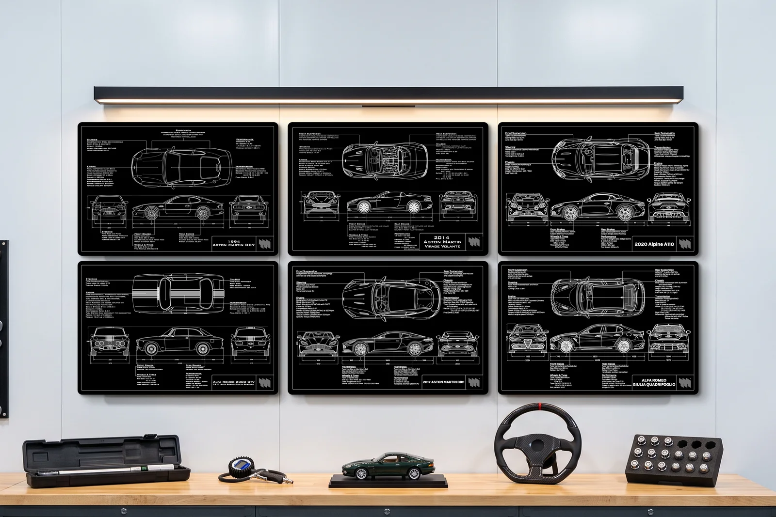 2014 Aston Martin Virage Volante, one of six on a workshop wall